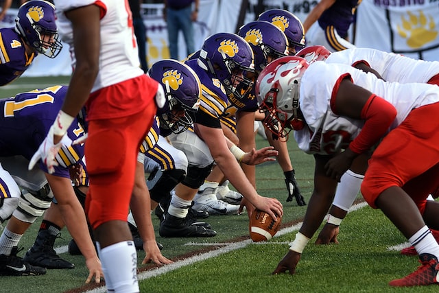 American football players in a fumble