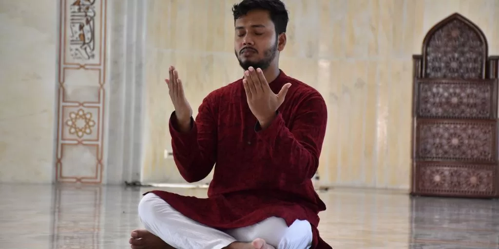 A man meditating in silence