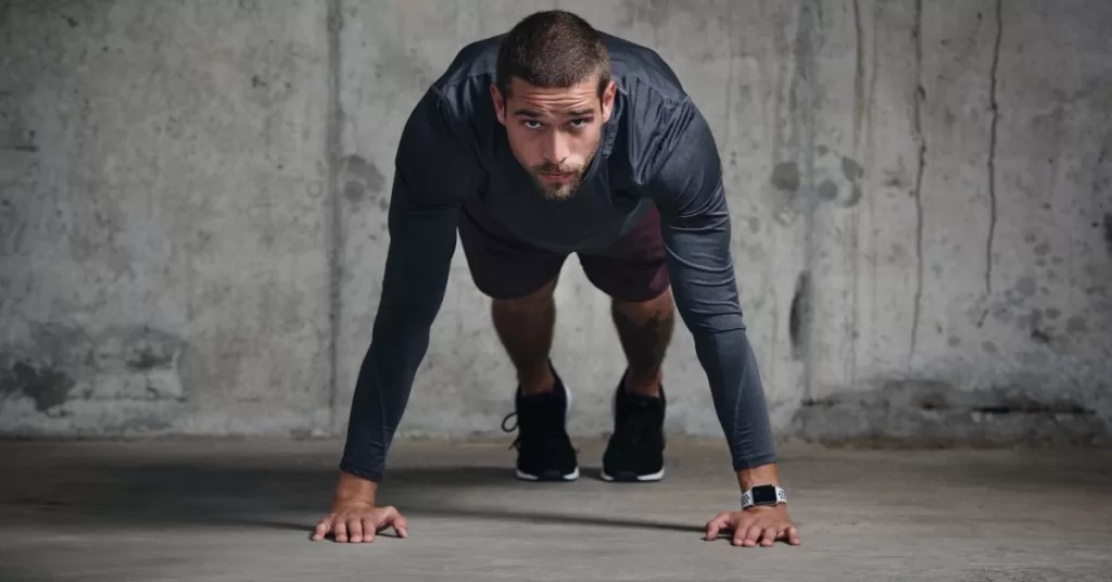 A mentally resilient athlete performing pushups
