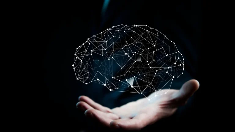 3d brain model held in a hand