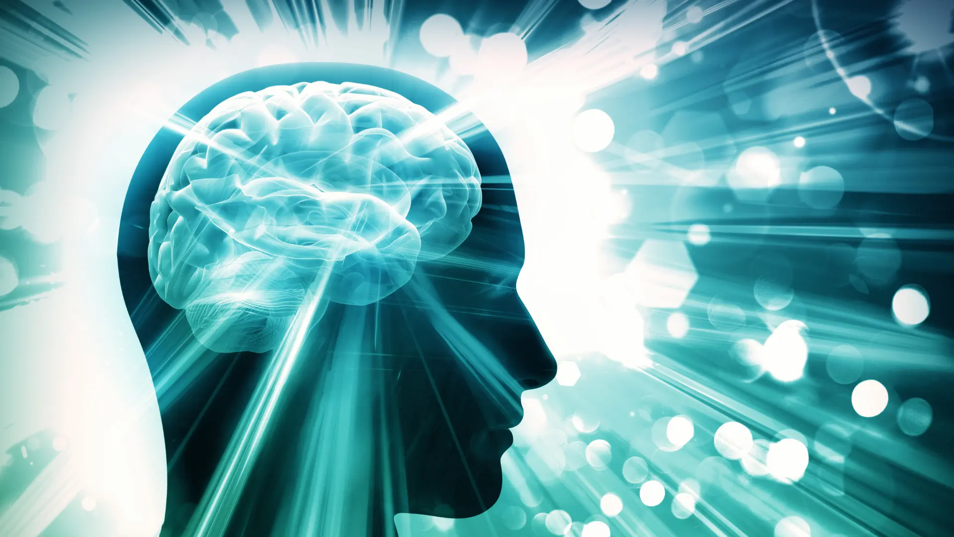 A glowing brain inside a human head