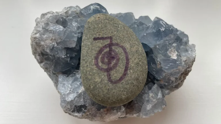 "Cho Ku Rei" Reiki symbol drawn on a stone