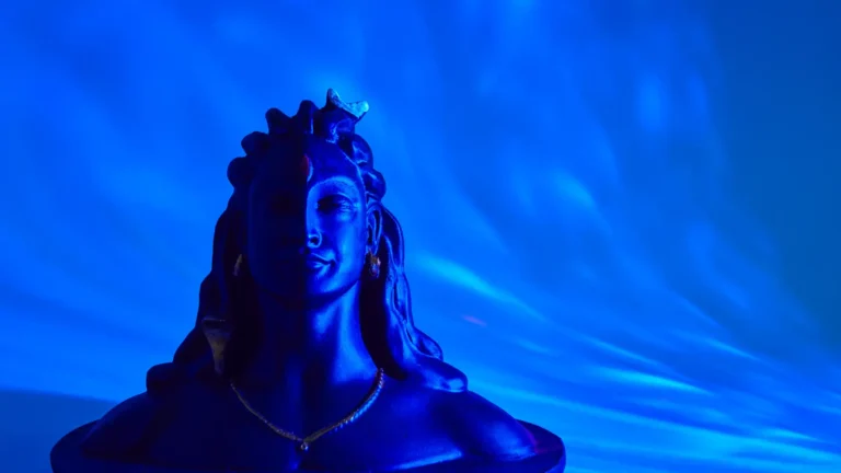 Shiva figurine on a black background symbolizing the divine